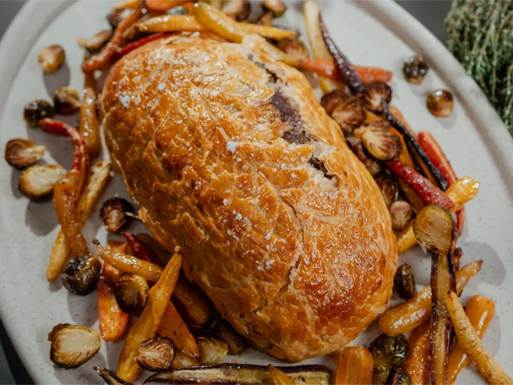 Champignons sautés au beurre et à l’ail avec boeuf wellington