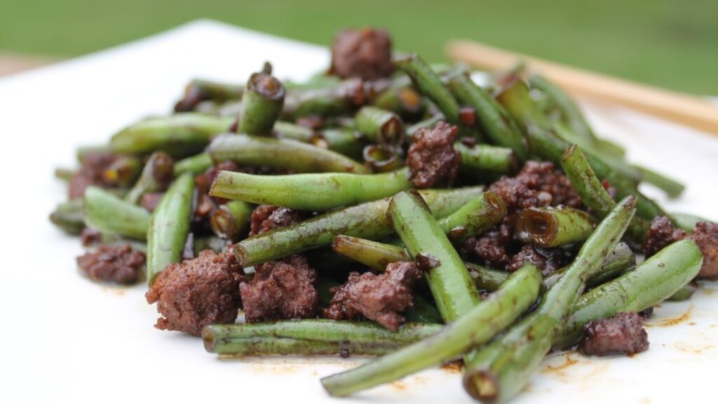 Haricots verts sautés à l’ail avec boeuf wellington